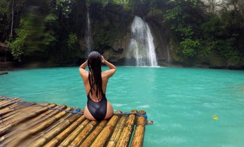 Girl in Kawasan Falls in Badian