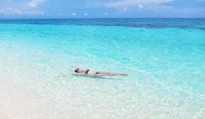 A girl swimming in Kalanggaman Island